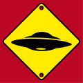 road sign warning flying saucer passageway, with a UFO pictogram.